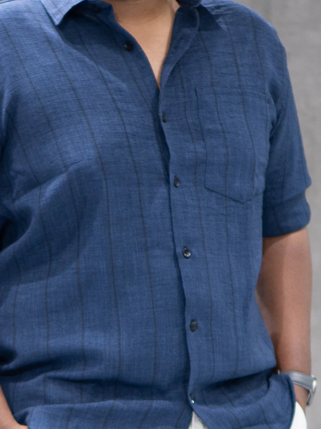 Blue striped short sleeve button-up shirt for men, ideal for office or casual wear