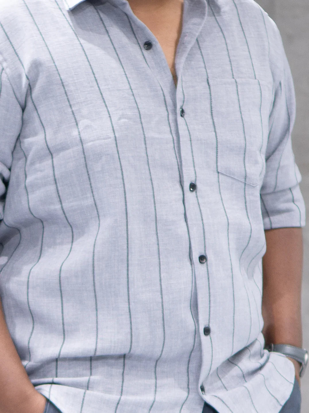 Light gray striped men's button-down shirt with chest pocket, ideal for office or smart casual wear